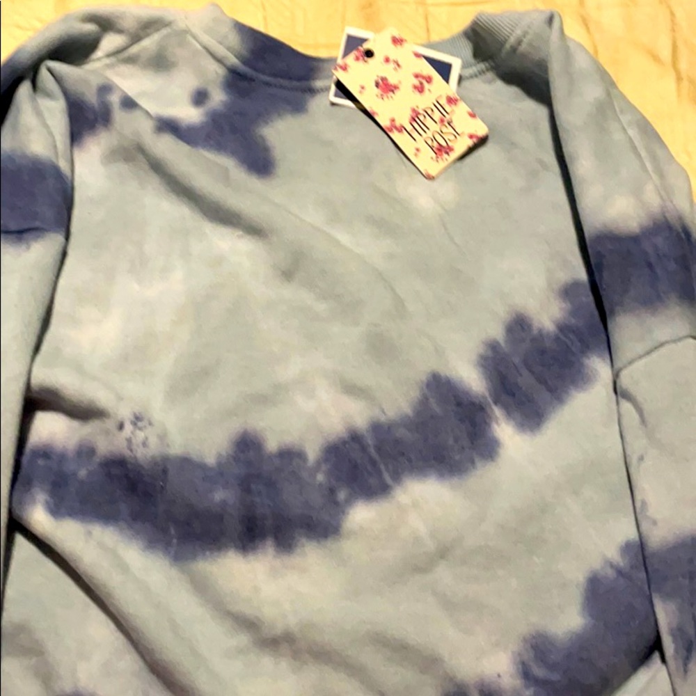Blue tie dye top with tag still on